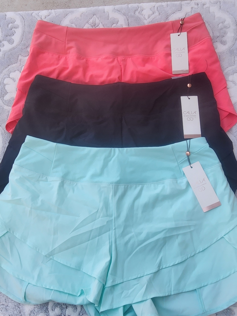CALIA by Carrie Underwood Tiered Athletic Skorts in Coral, Mint & Black - Picture 2 of 9
